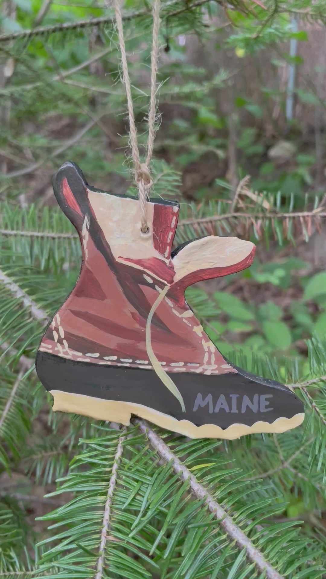 Video of Maine Bean Boot ornament handmade and hand-painted by brandy cressey raymond at florence farmstead